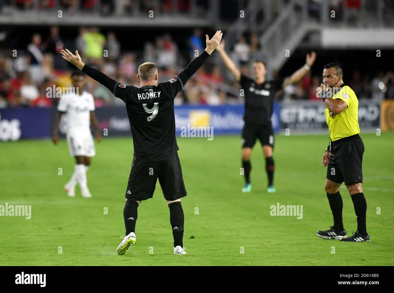 Il giocatore della DC United Wayne Rooney reagisce durante la partita di calcio della Major League tra il D.C. United e il Vancouver Whitecaps FC all'Audi Field Stadium il 14 luglio 2018 a Washington D.C. Foto Stock