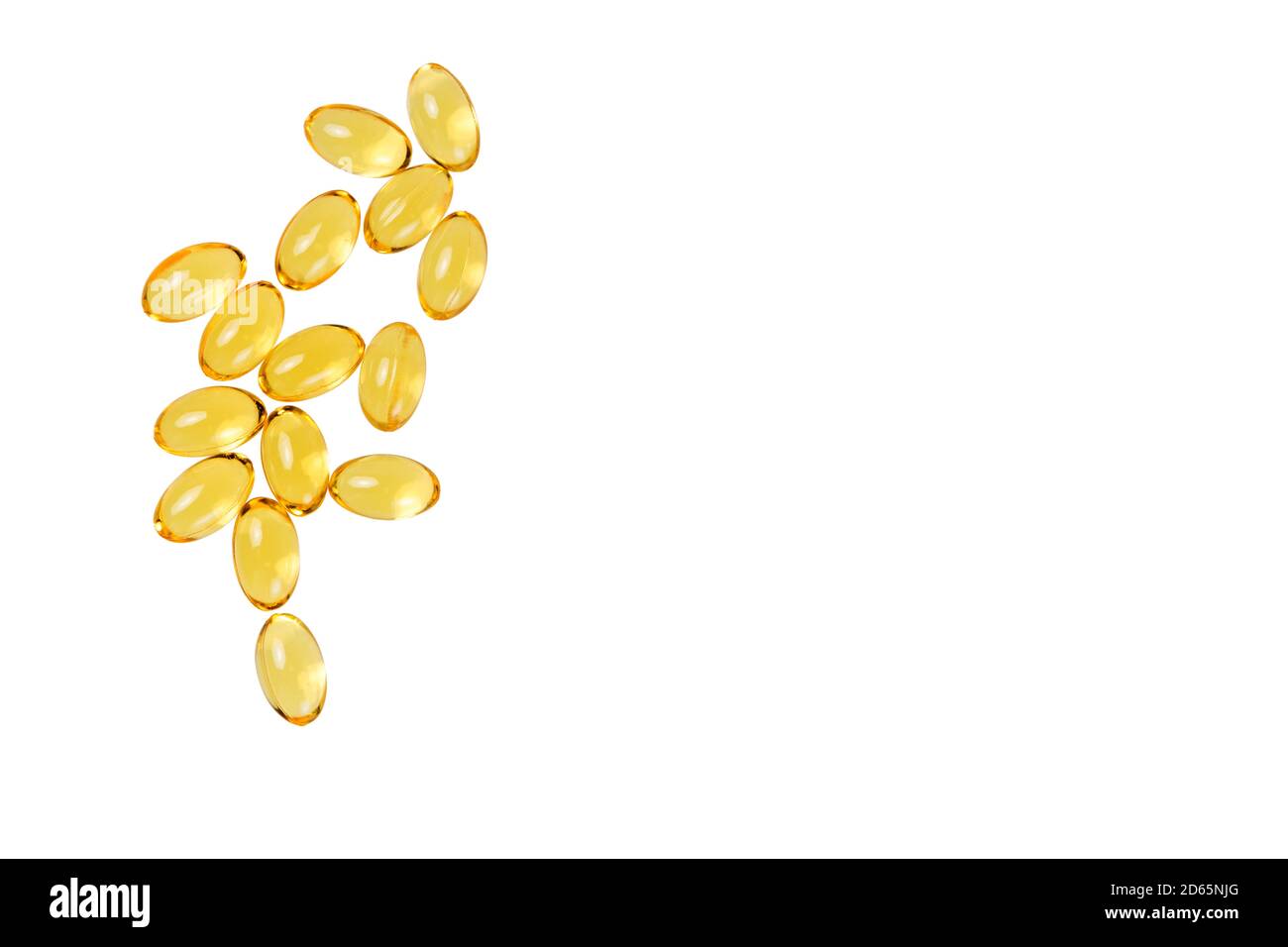 Capsule di vitamina D sparse su sfondo bianco. Additivo alimentare Foto Stock