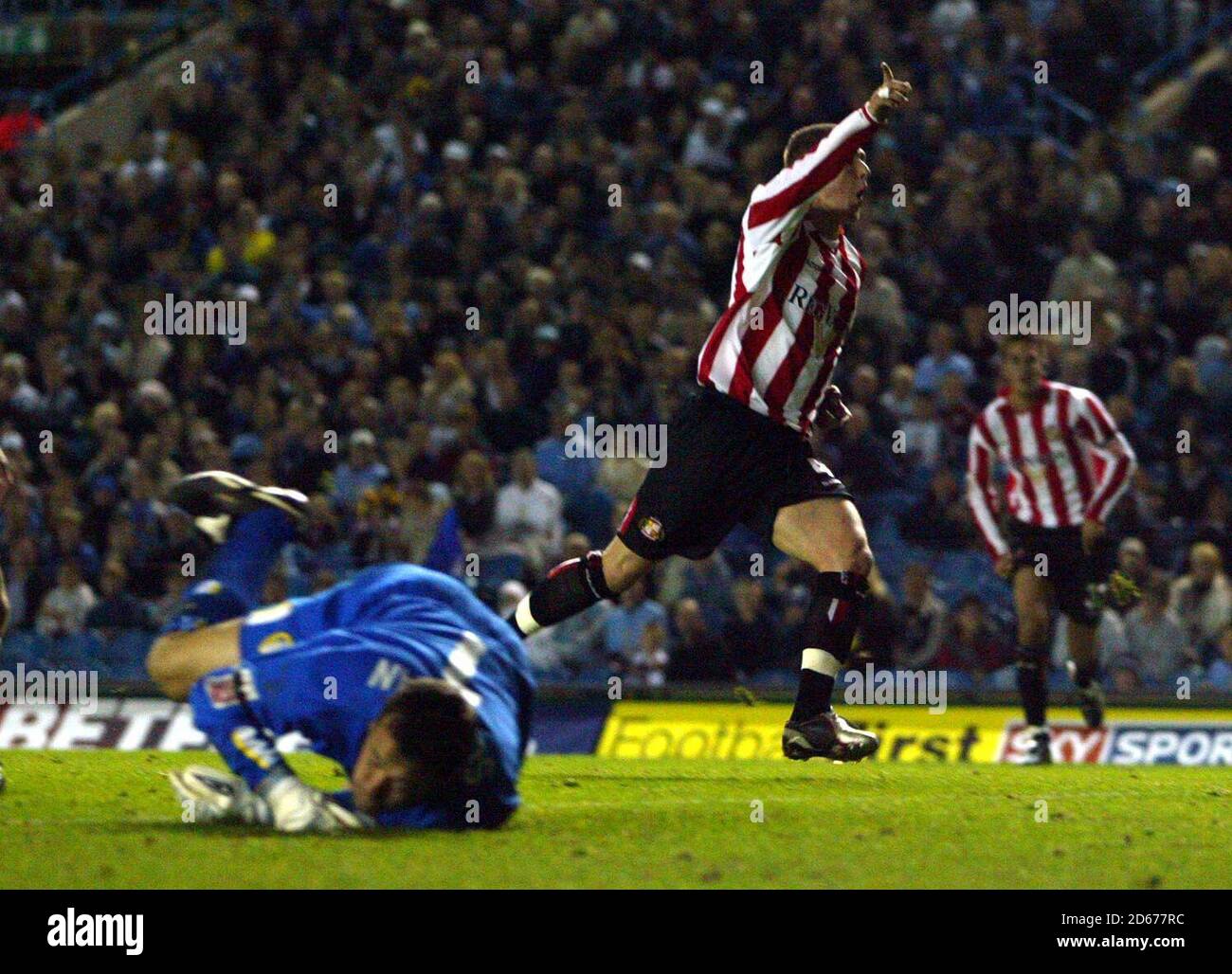 Carl Robinson di Sunderland festeggia il traguardo di apertura dopo Leeds Portiere degli Stati Uniti Neil Sullivan (l) Foto Stock