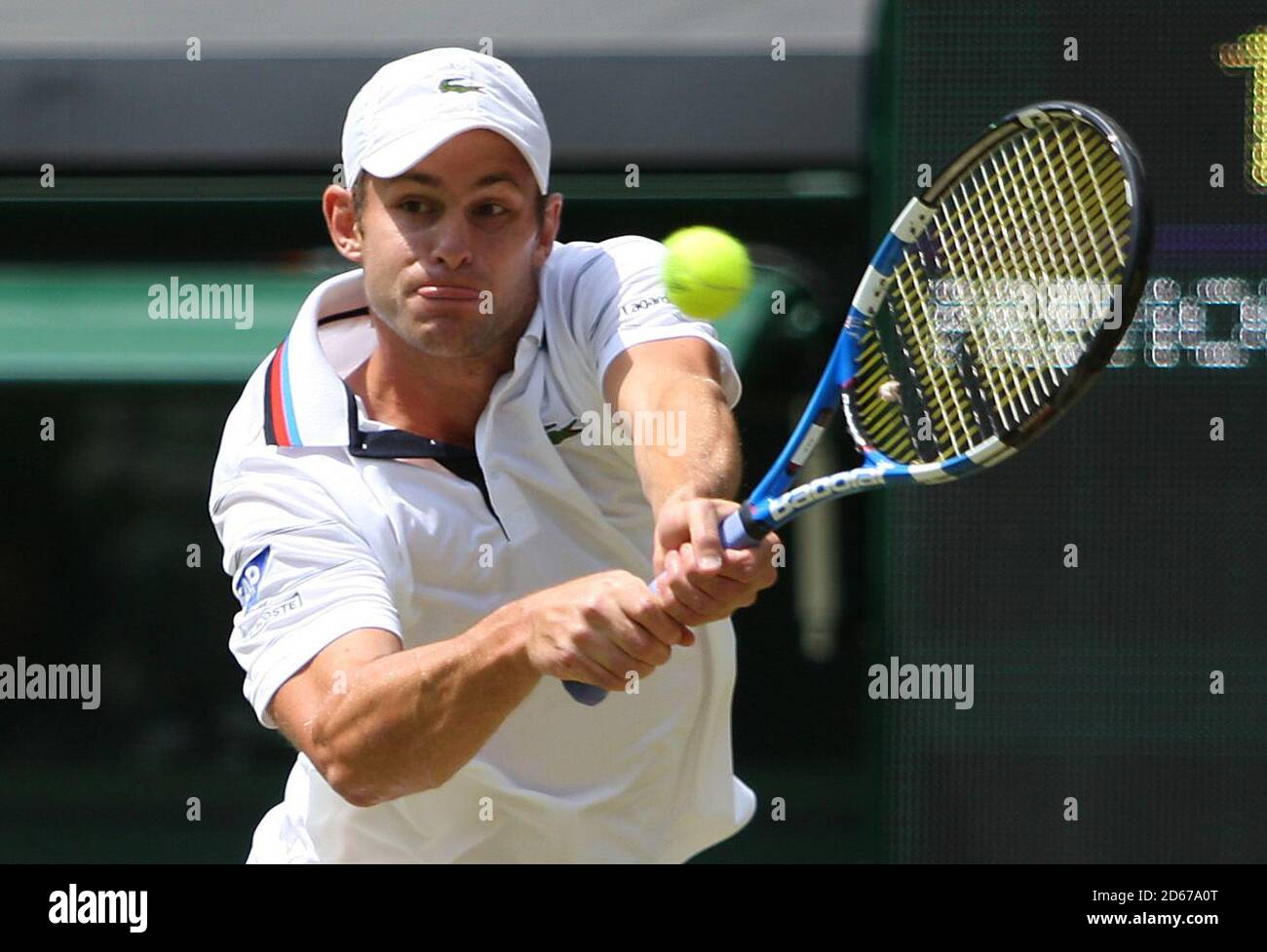 Andy Roddick degli Stati Uniti in azione contro Michael Llodra della Francia Foto Stock