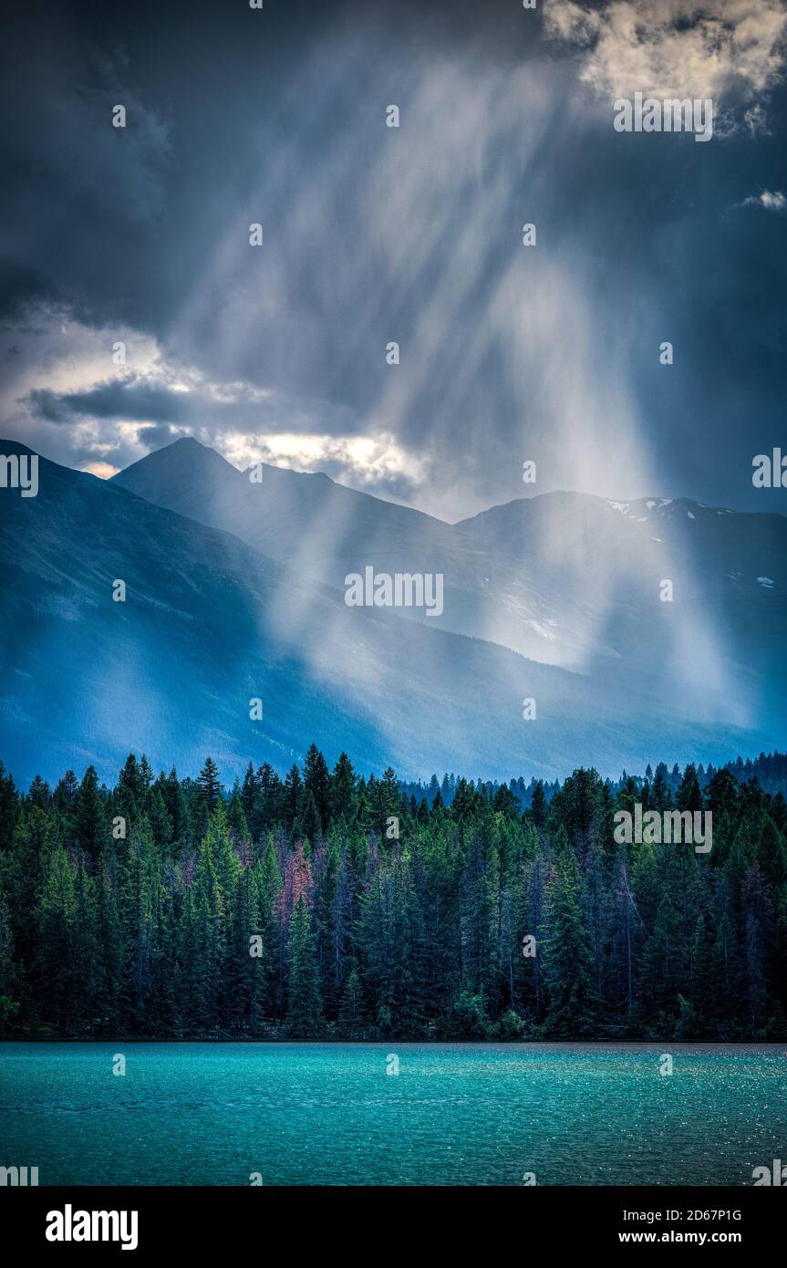 Raggi di luce sul lago Annette. Foto Stock