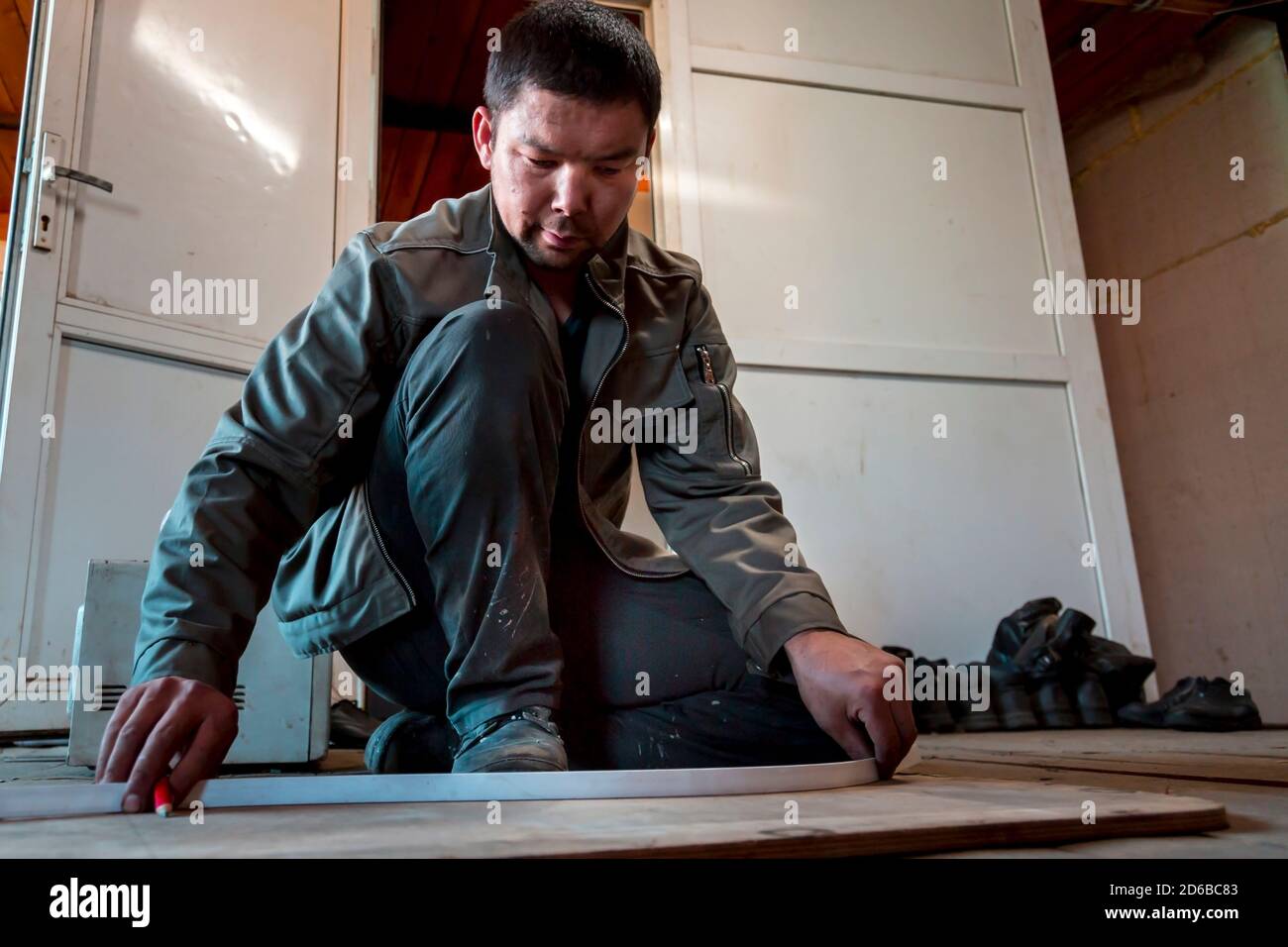 Primo piano ritratto di fabbro sul posto di lavoro Foto Stock