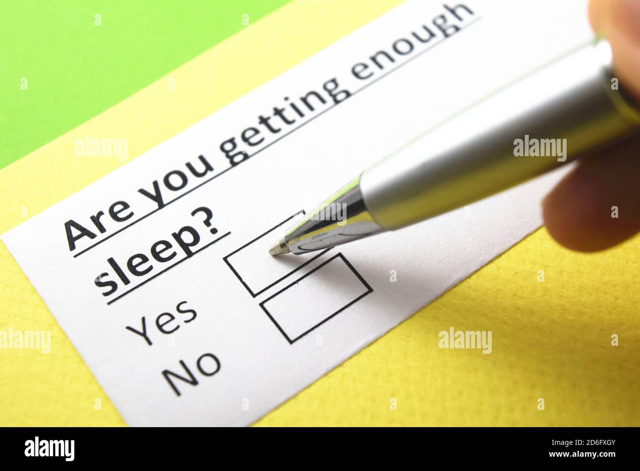 Stai ottenendo abbastanza sonno? Sì o no? Foto Stock