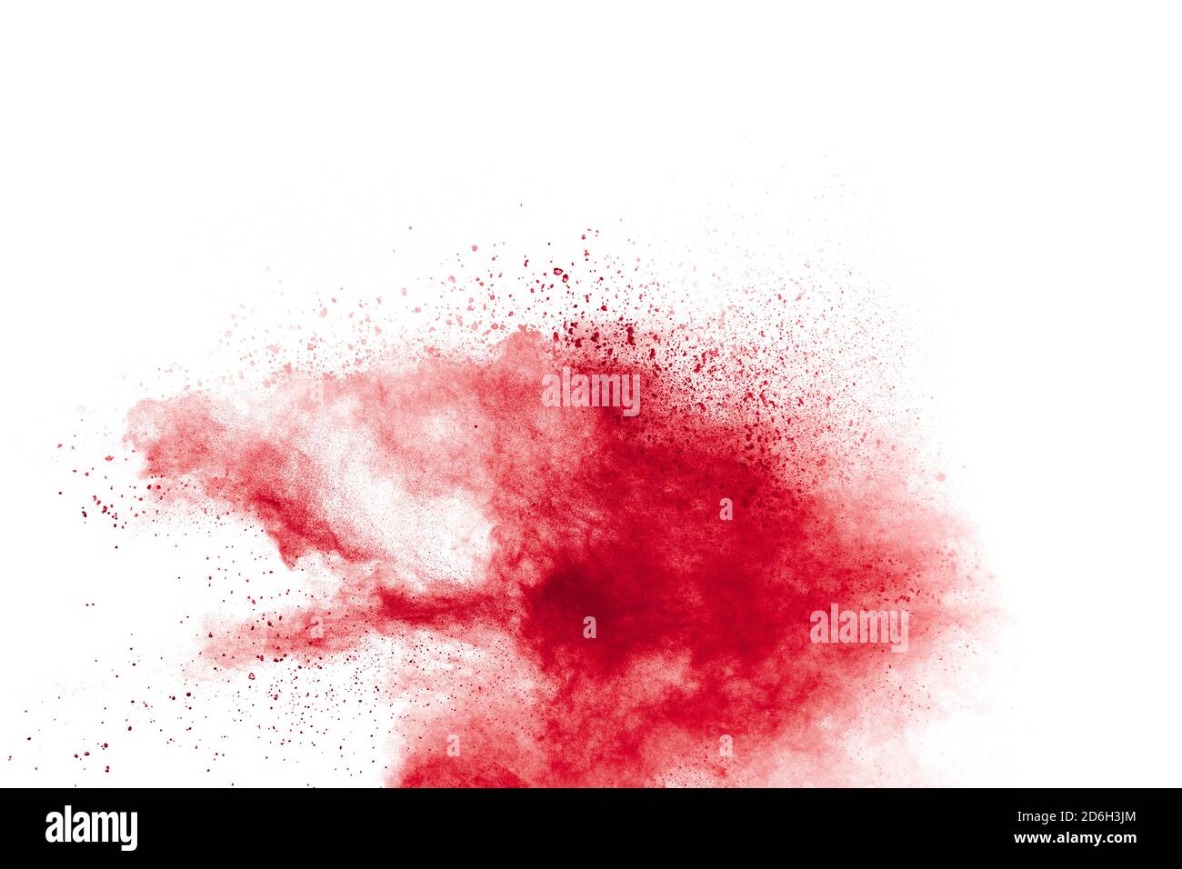 Rosso di esplosione di polvere su sfondo bianco. Congelare il movimento di rosso le particelle di polvere splash. Foto Stock