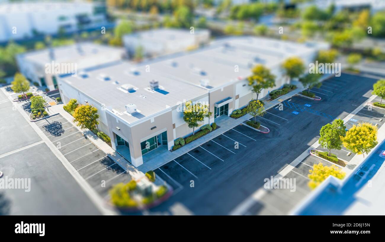 Vista aerea degli edifici commerciali con blur Tilt-Shift. Foto Stock