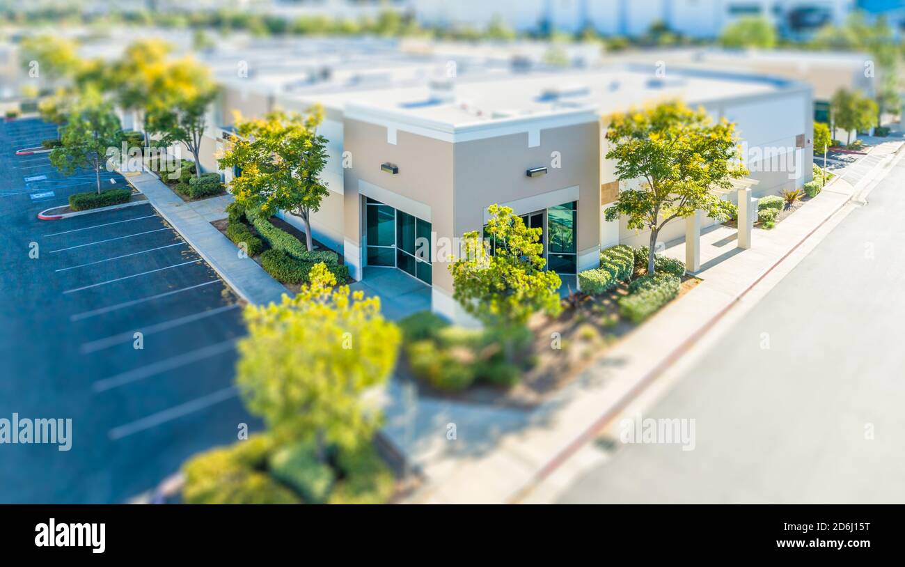 Vista aerea degli edifici commerciali con blur Tilt-Shift. Foto Stock