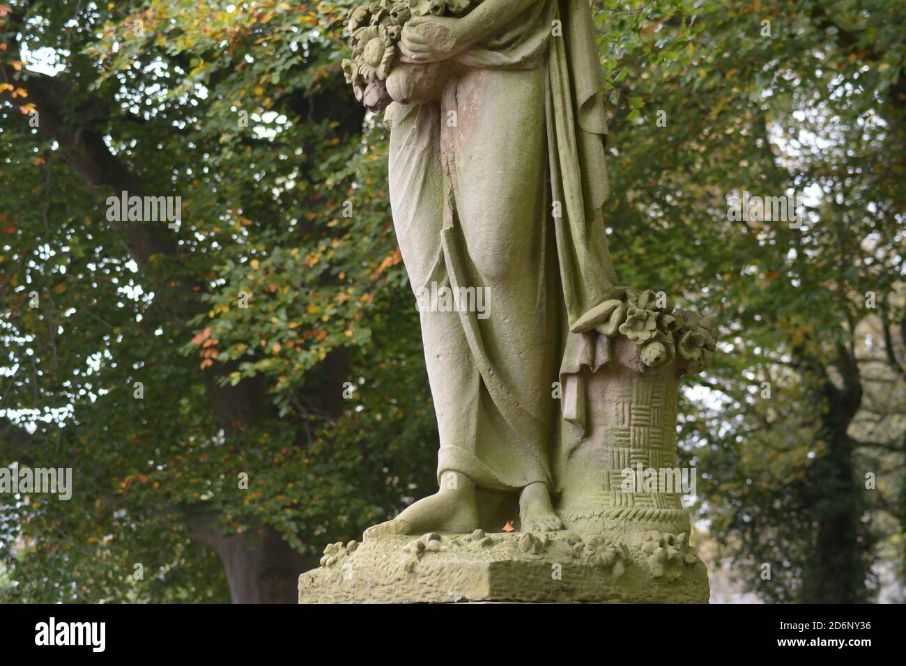 Gambe della statua Foto Stock