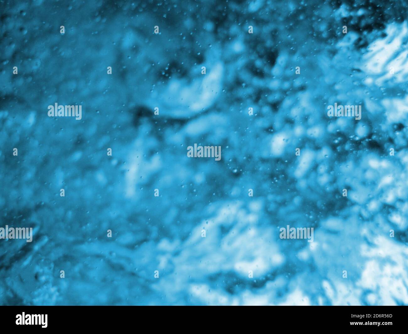 acqua blu con bolle di ossigeno come sfondo piacevole Foto Stock