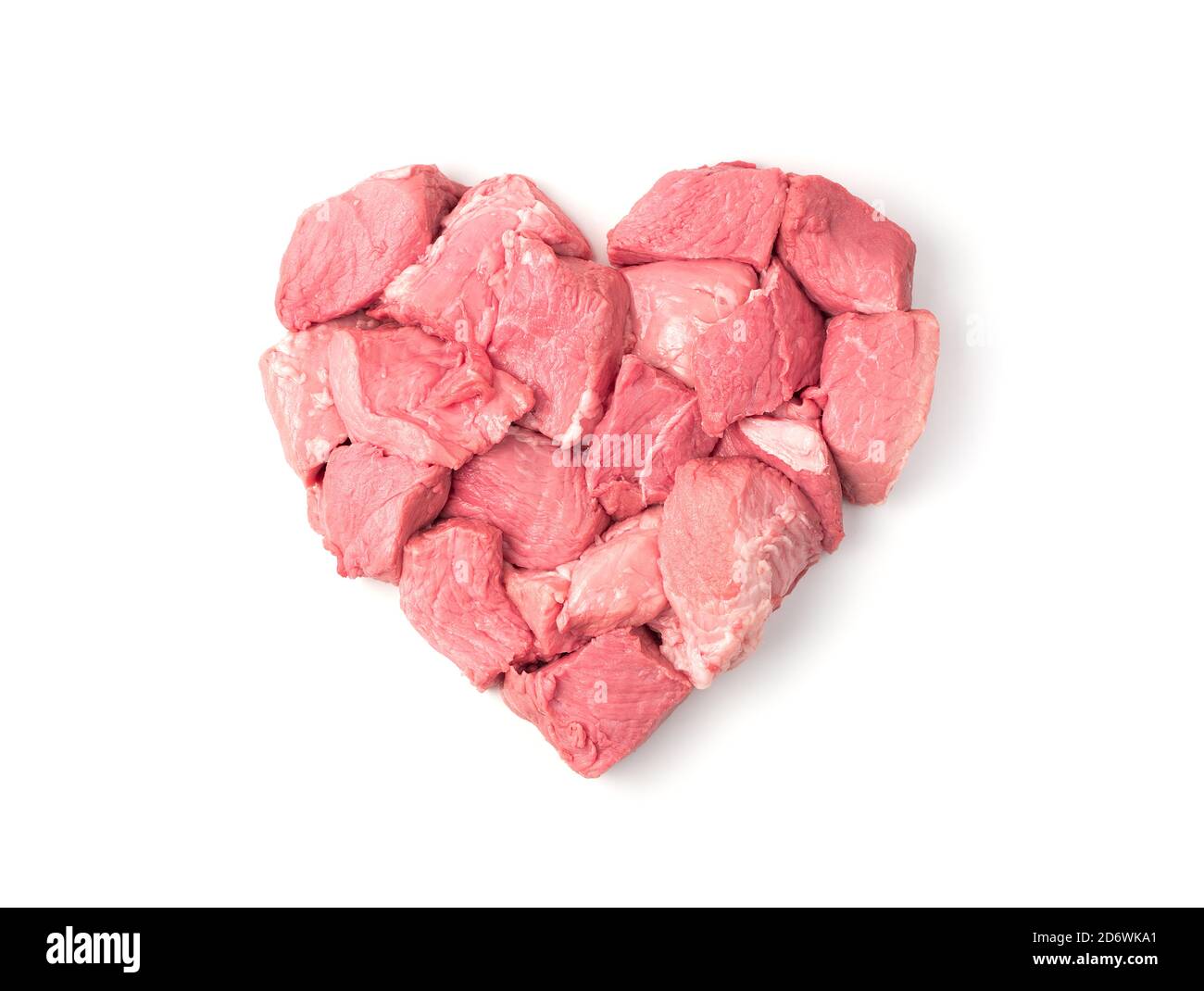 Carne cruda a forma di cuore. La vista dall'alto. Foto Stock
