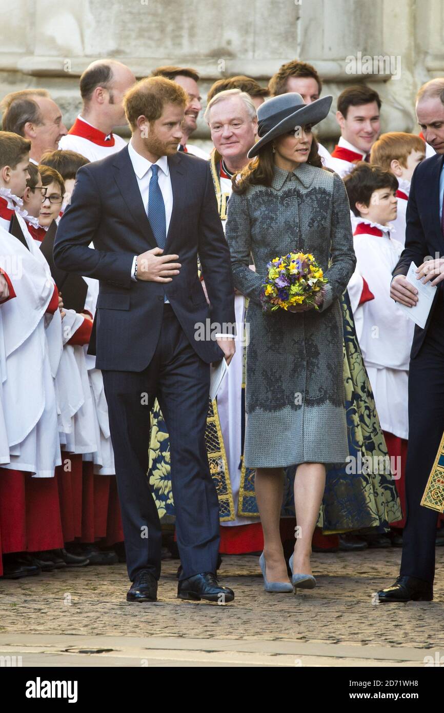 Il Principe Harry e la Duchessa di Cambridge lasciano l'Abbazia di Westminster a Londra dopo il servizio annuale del Commonwealth Day. Foto Stock