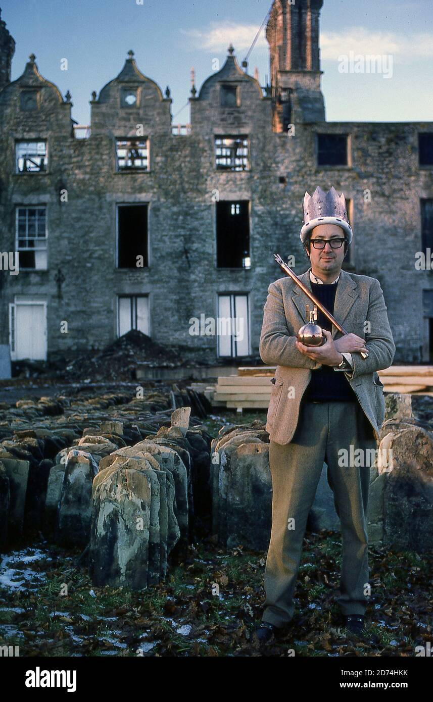 Richard Booth Book seller e self-styled 'King of Hay' a casa nel suo castello 1979 Foto Stock