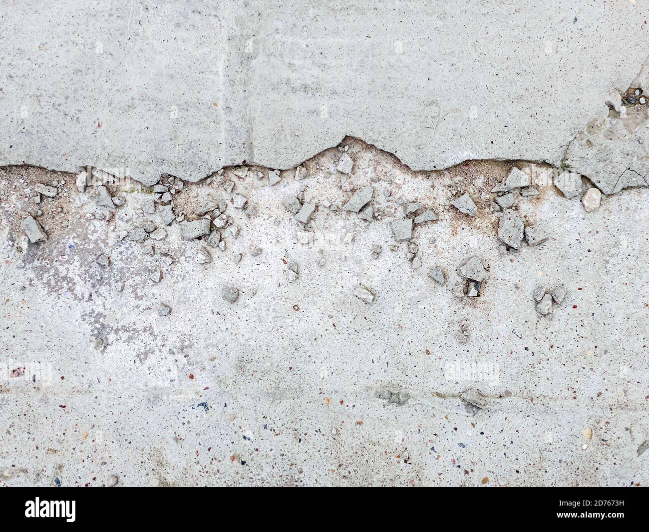 ruvida crack cementizia texture. fondo pavimento in cemento grigio Foto Stock