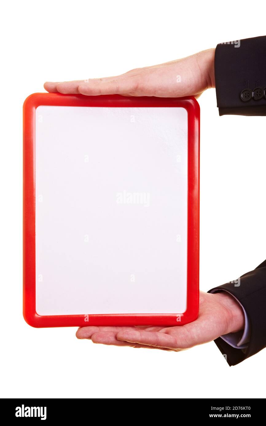 Mani che tengono una piccola lavagna bianca vuota con cornice rossa Foto Stock