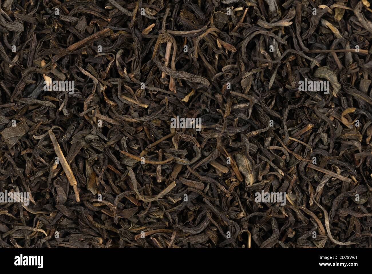 Tè secco foglie di sfondo texture. Primo piano Foto Stock