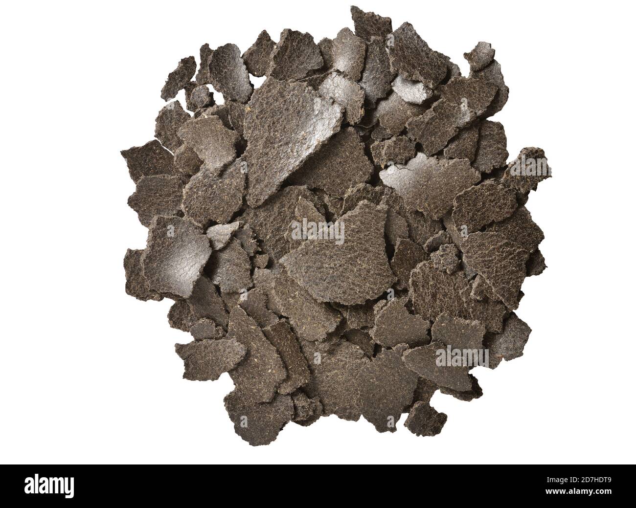 Farina di girasole per l'alimentazione animale su sfondo bianco isolato Foto Stock