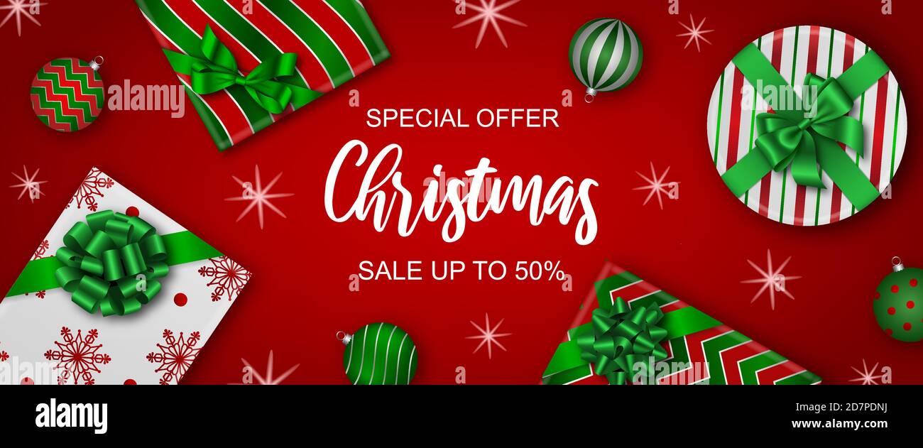 banner di vendita di natale con scatole regalo e palle di natale Illustrazione Vettoriale