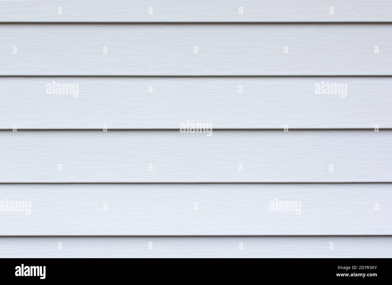 Schierandosi in bianco sulla parte esterna di una casa Foto Stock