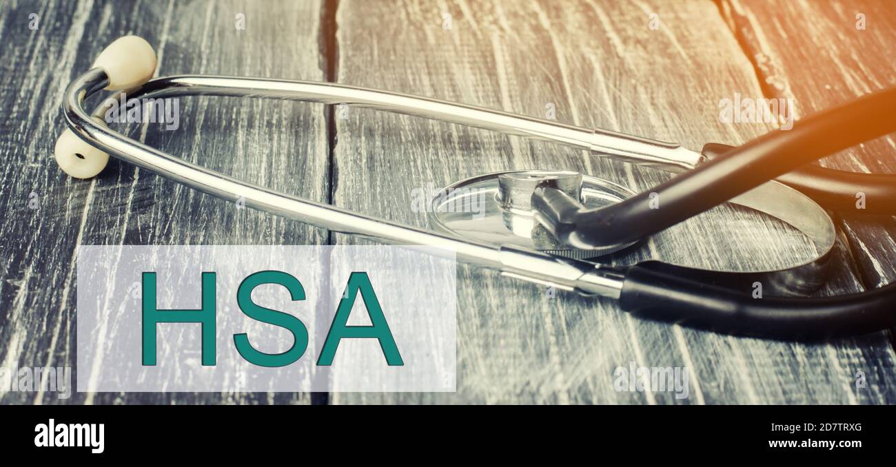 Stetoscopio e iscrizione HSA - conto di risparmio per la salute. Tipo di conto di risparmio che permette di mettere da parte i soldi su una base di pre-imposta per pagare per qualificie Foto Stock