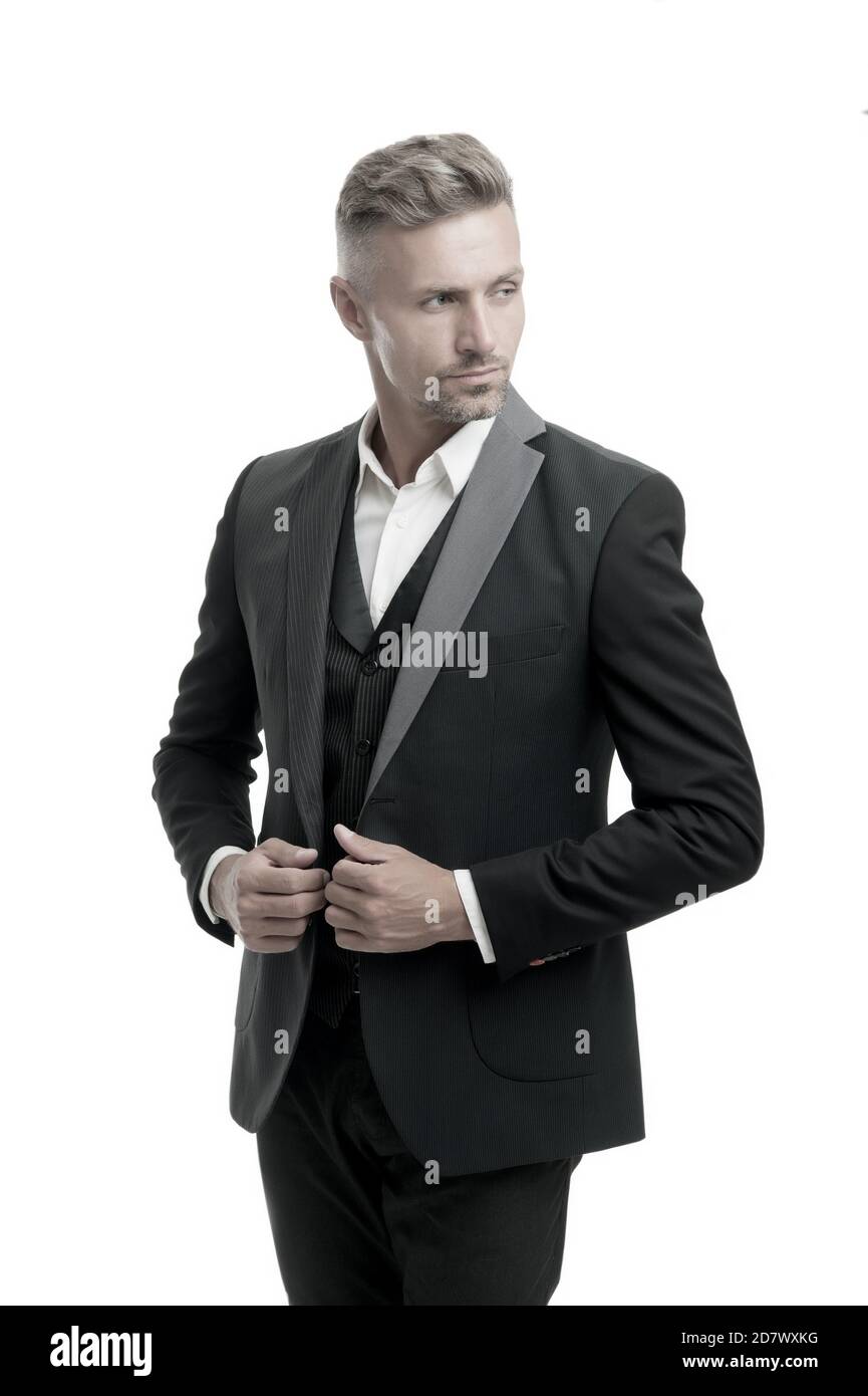 Abito realizzato su misura. Affitto servizio tuta. Vestito elegante.  Gentleman fashion style. Menswear concetto. Guy ben curato bello macho  indossare nero Tuxedo. Lo sposo tendenza di moda. Moda. Tendenza moderna  Foto stock -