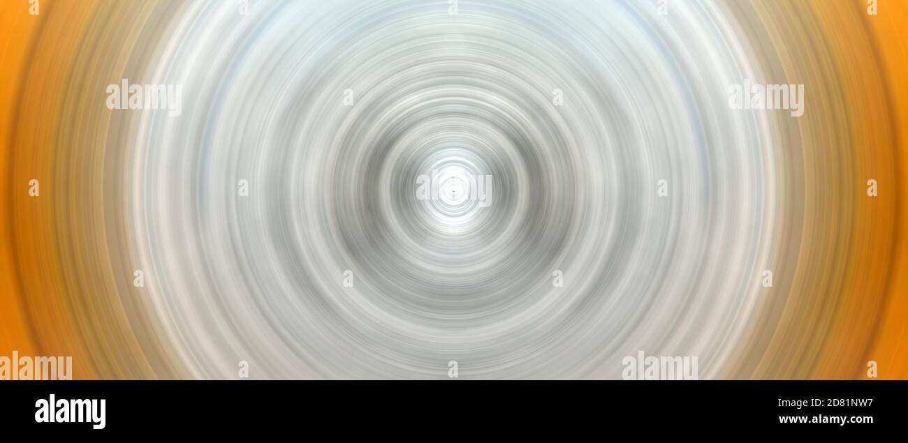 Astratto rotondo sfondo giallo. Cerchi dal punto centrale. Immagine di cerchi divergenti. Rotazione che crea cerchi. Foto Stock
