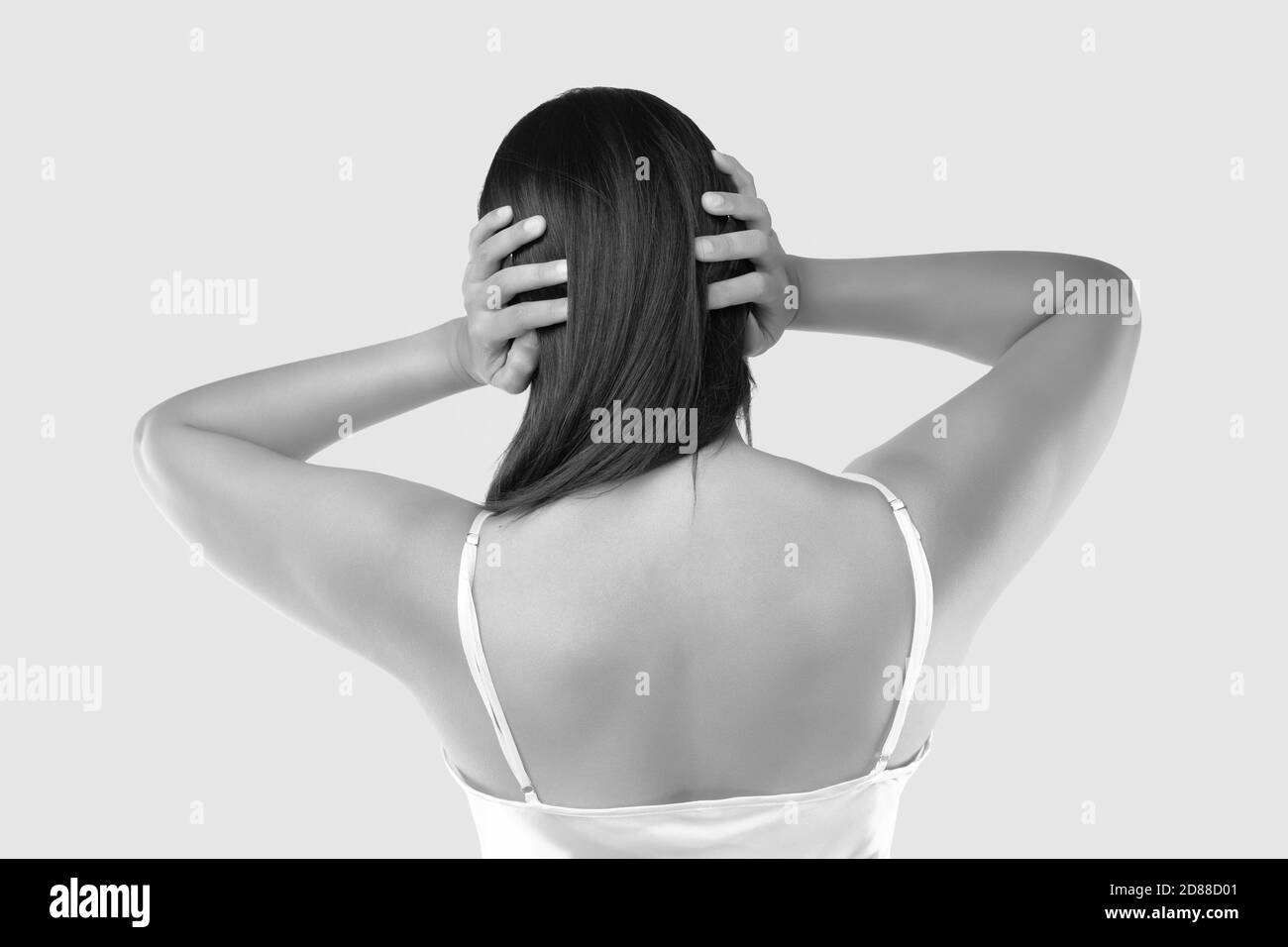ha un mal di testa Foto Stock