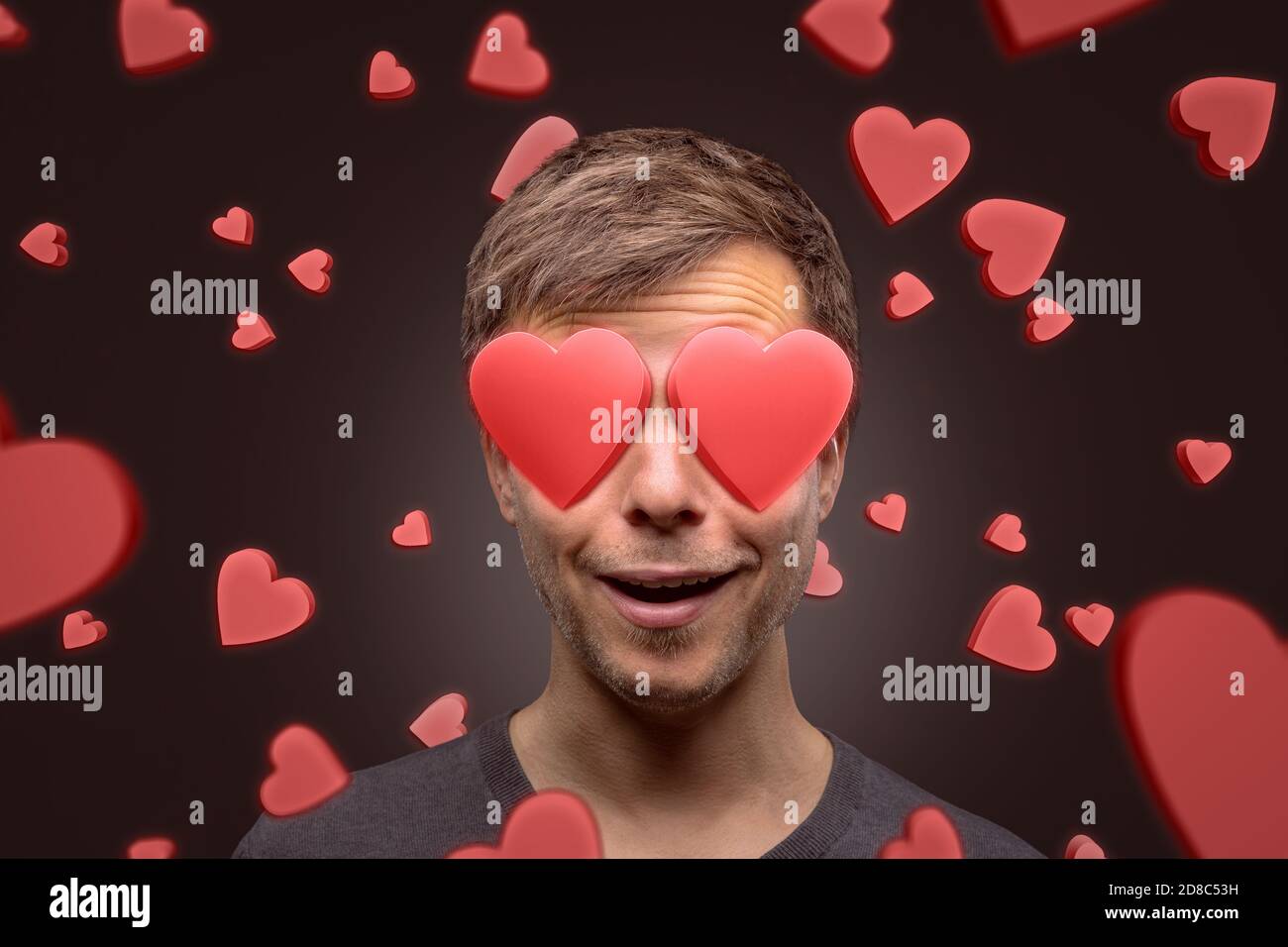 Ritratto di un uomo con occhi a forma di cuore Foto Stock