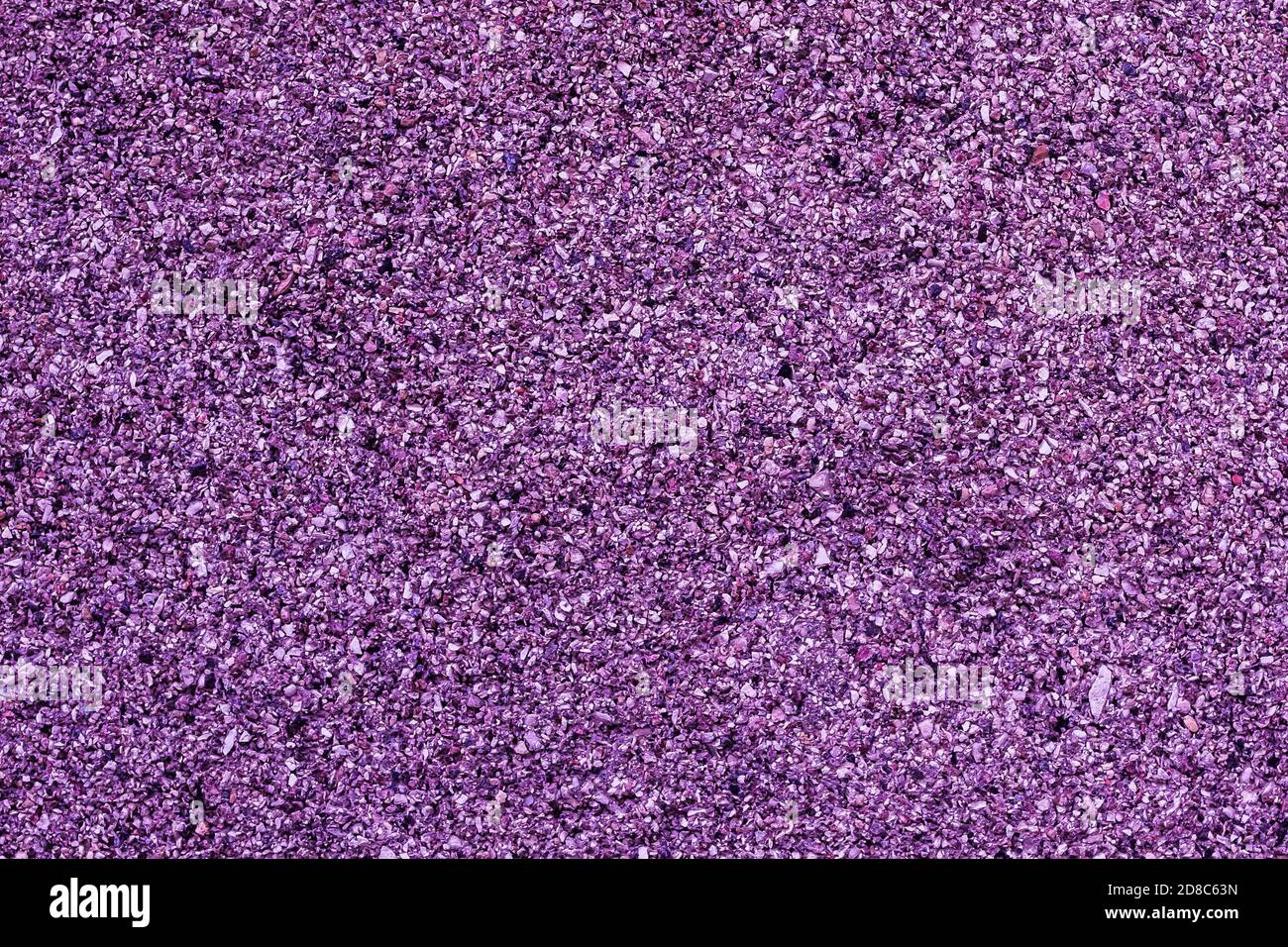 Natale lucido sfondo lilla fatto di piccoli beads.effetto di granulosità artistica Foto Stock