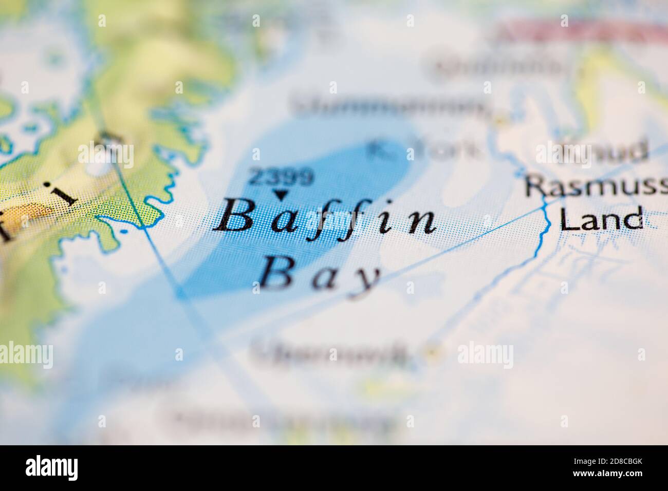 Profondità di campo ridotta fuoco sulla posizione geografica della mappa di Baffin Bay al largo della costa del Canada sull'atlante Foto Stock