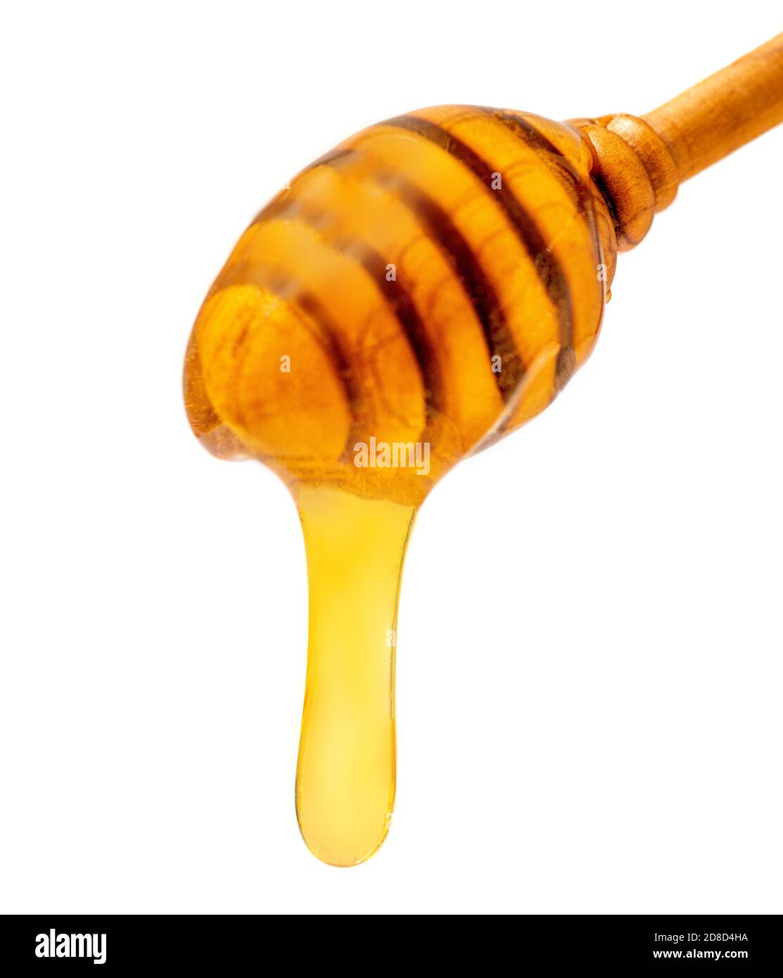 Il miele gocciola isolato su uno sfondo bianco. Primo piano miele biologico. Foto Stock