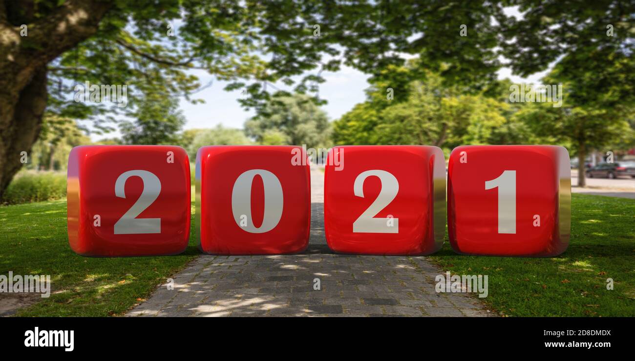 Nuovo anno 2021 cifre bianche su cubi rossi, sfondo verde sfocato della natura, giornata di sole in un parco cittadino. illustrazione 3d Foto Stock