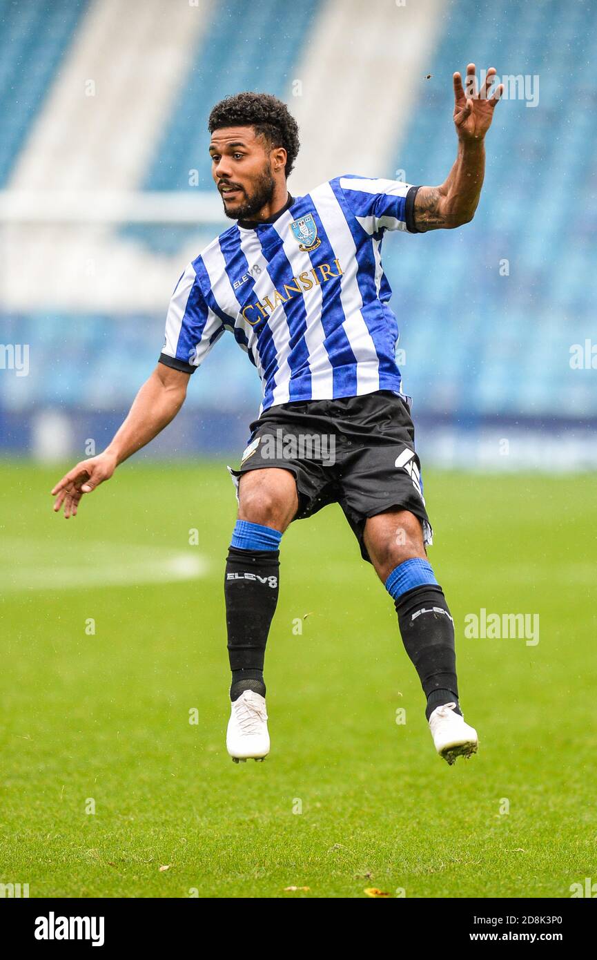 Elias Kachunga (45) di Sheffield Mercoledì guarda come suo colpo viene salvato Foto Stock