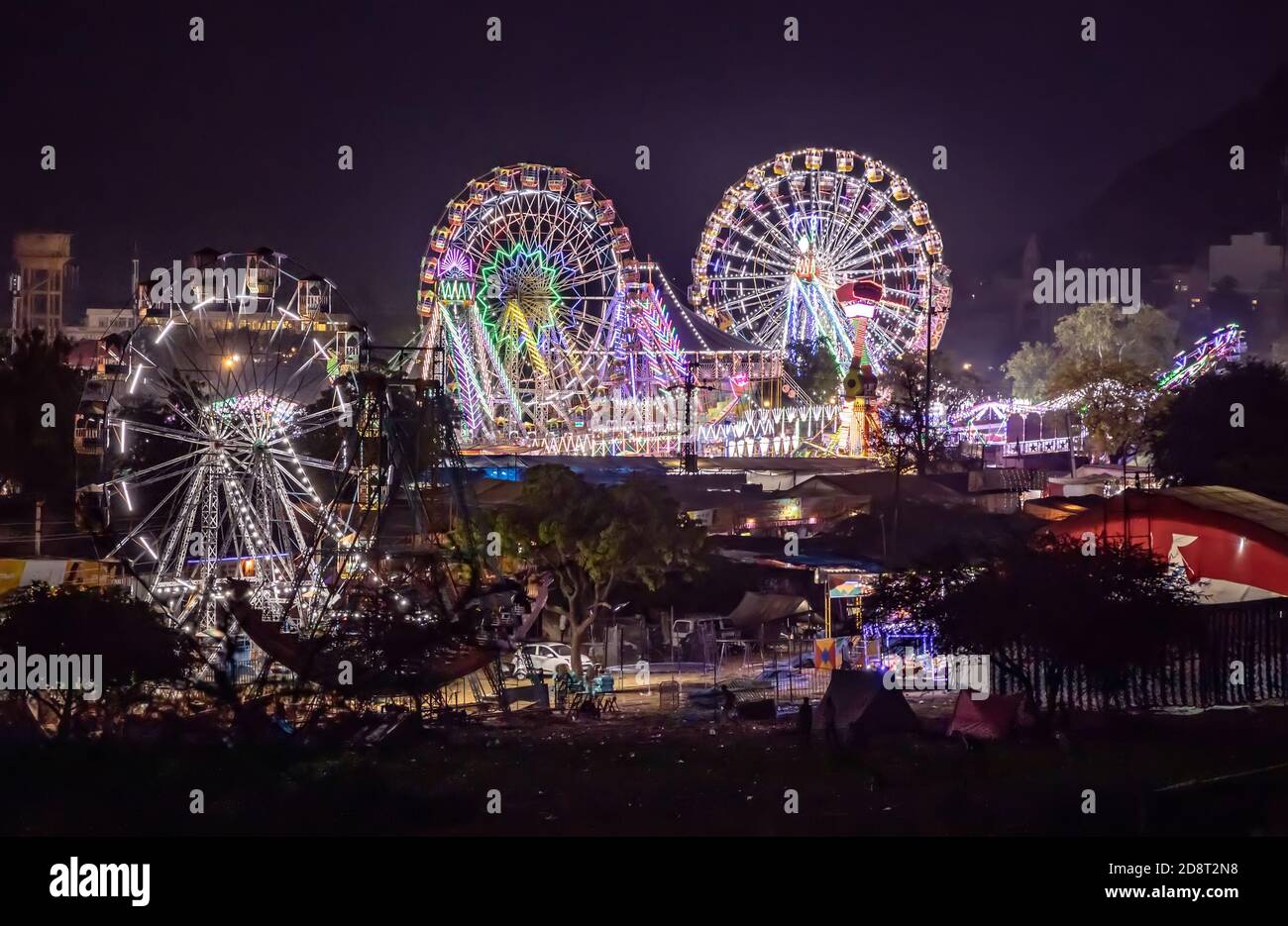 Illuminazione ruota panoramica di notte Foto Stock