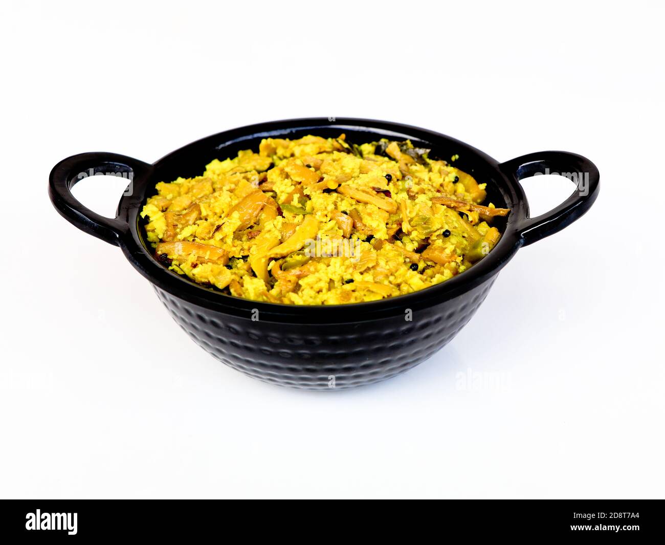 Perum koon o Kerala funghi curry preparato con occhio di uccello peperoncino e foglie di curry usati come contorno per il riso Foto Stock