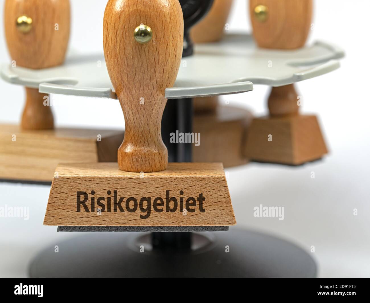 Timbro di legno con la scritta "Risikogebiet", traduzione "area di rischio" Foto Stock