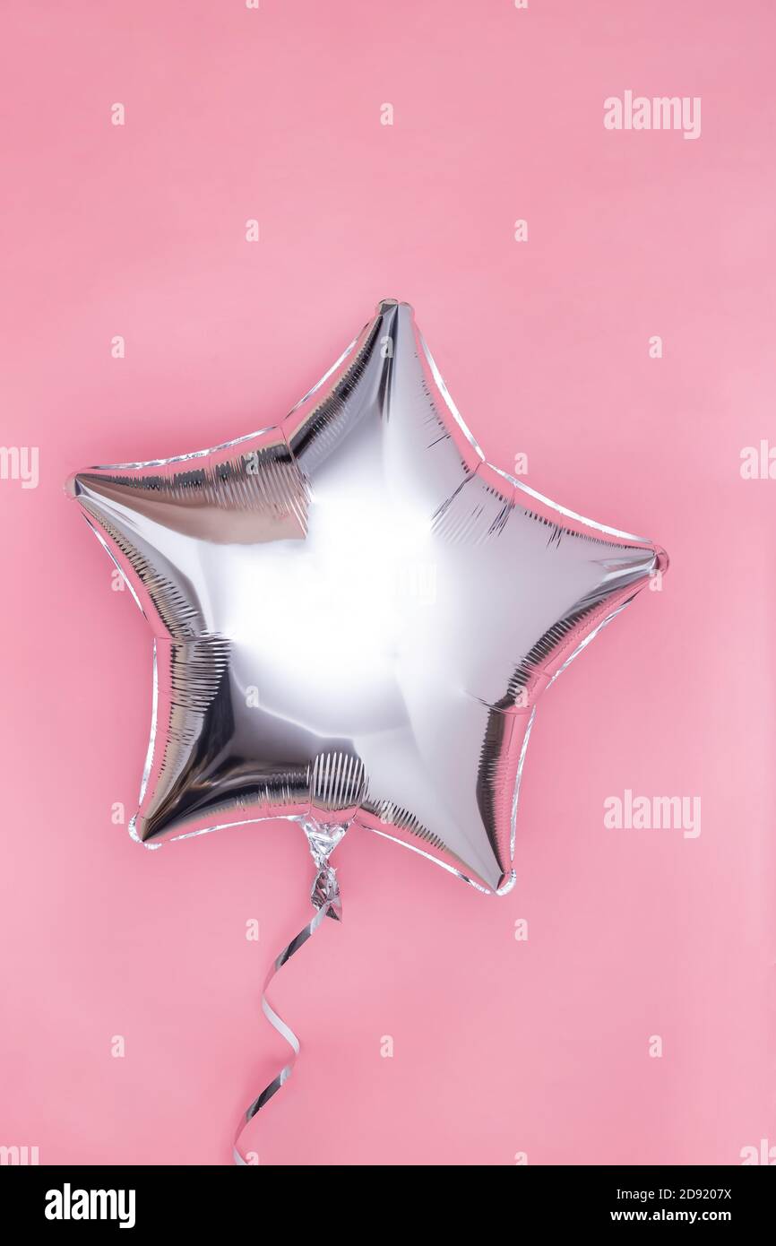 Palloncino a forma di stella con lamina di glitter argento Foto Stock