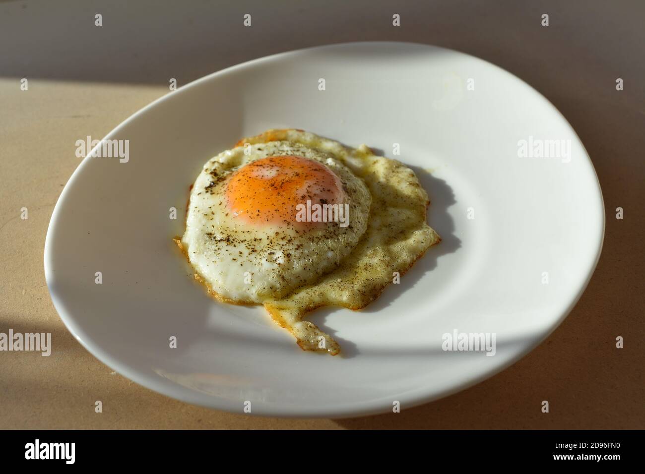 Sole all'uovo fritto Foto Stock