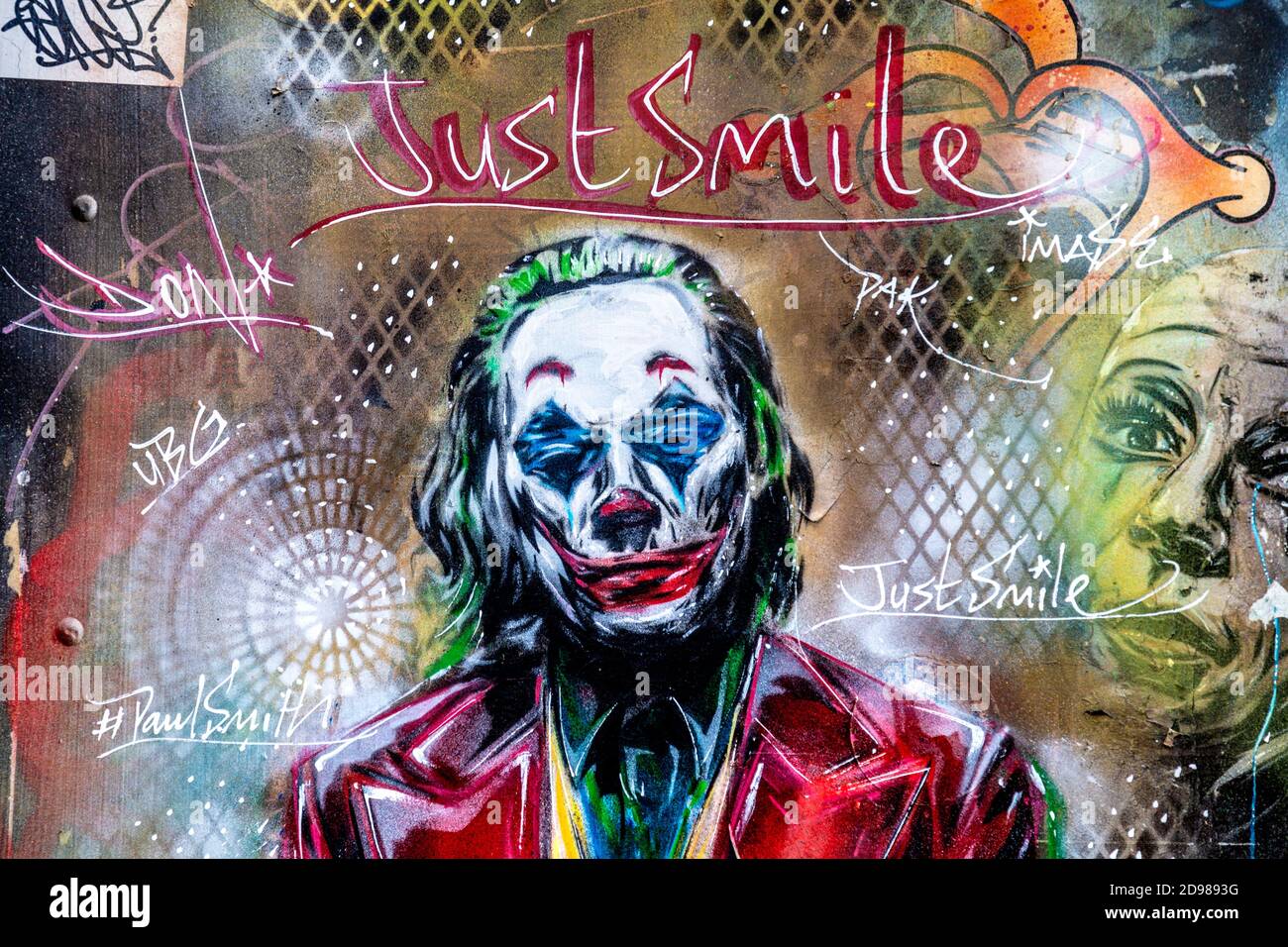 Murale del Joker con testo che dice 'Just Smile' a Soho, Londra, Regno Unito Foto Stock