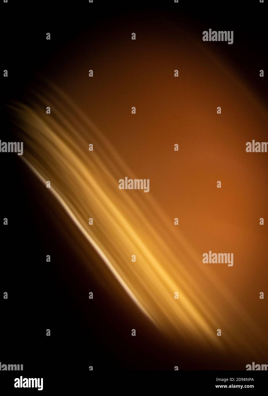 Strisce dorate astratte di luce Foto Stock