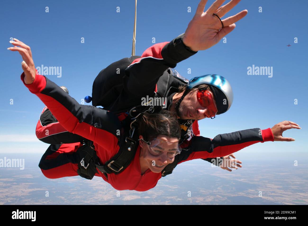 Sky diving tandem colore rosso Foto Stock