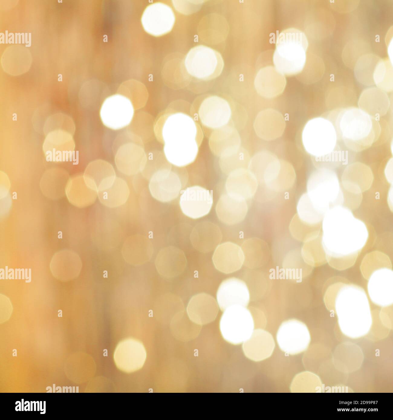 sfondo dorato, luci di natale bokeh. astratto rifocuso sfondo sfocato. Foto Stock