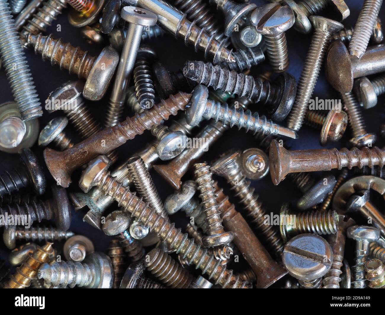 serie di molti bulloni, dadi, viti, rondelle Foto Stock