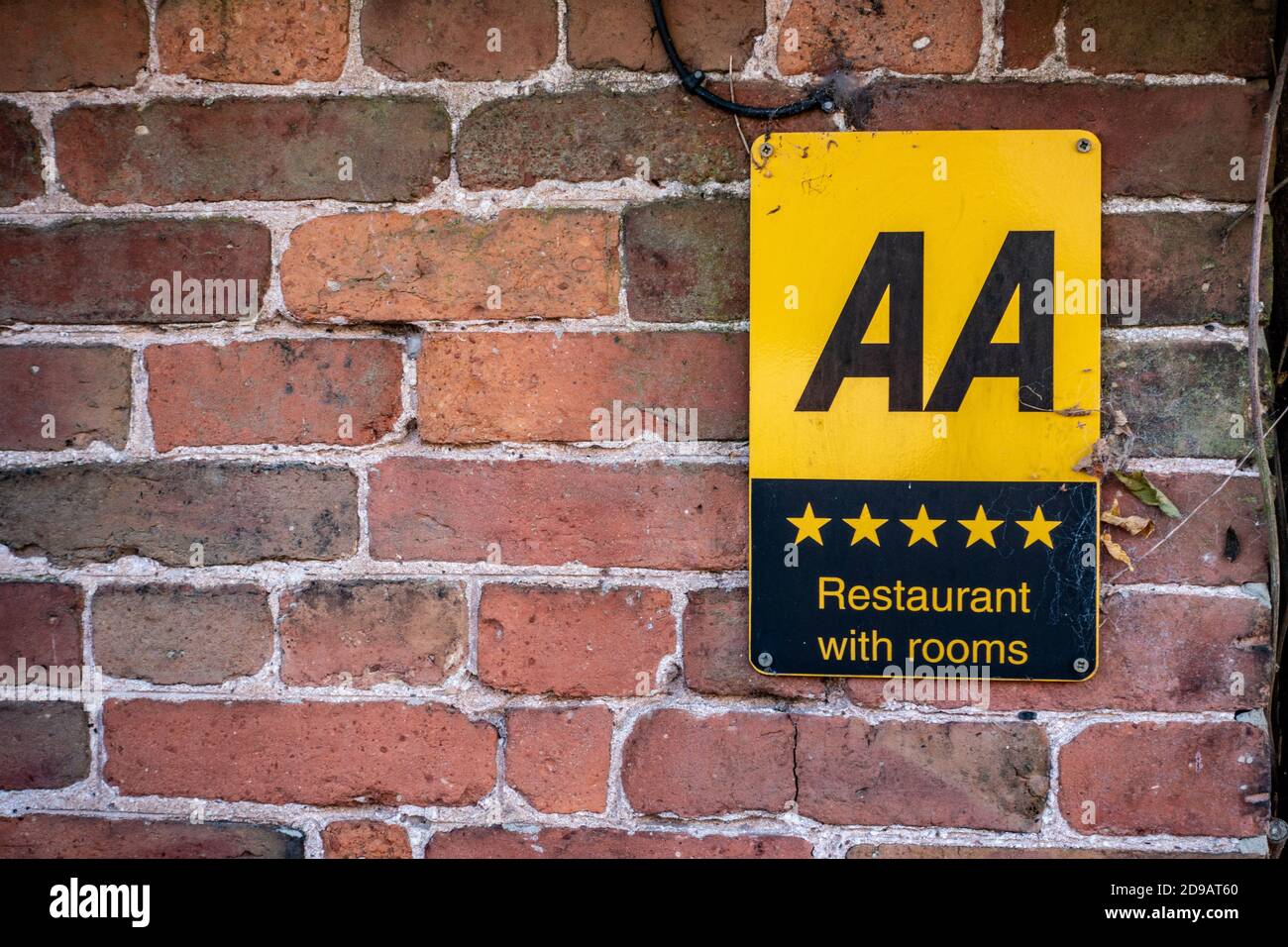 Cartello premio AA a cinque stelle sulla parete Foto Stock