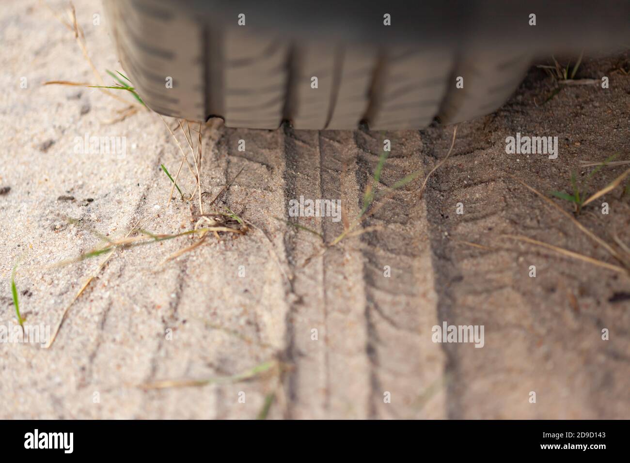 la stampa del battistrada del pneumatico sulla sabbia Foto Stock
