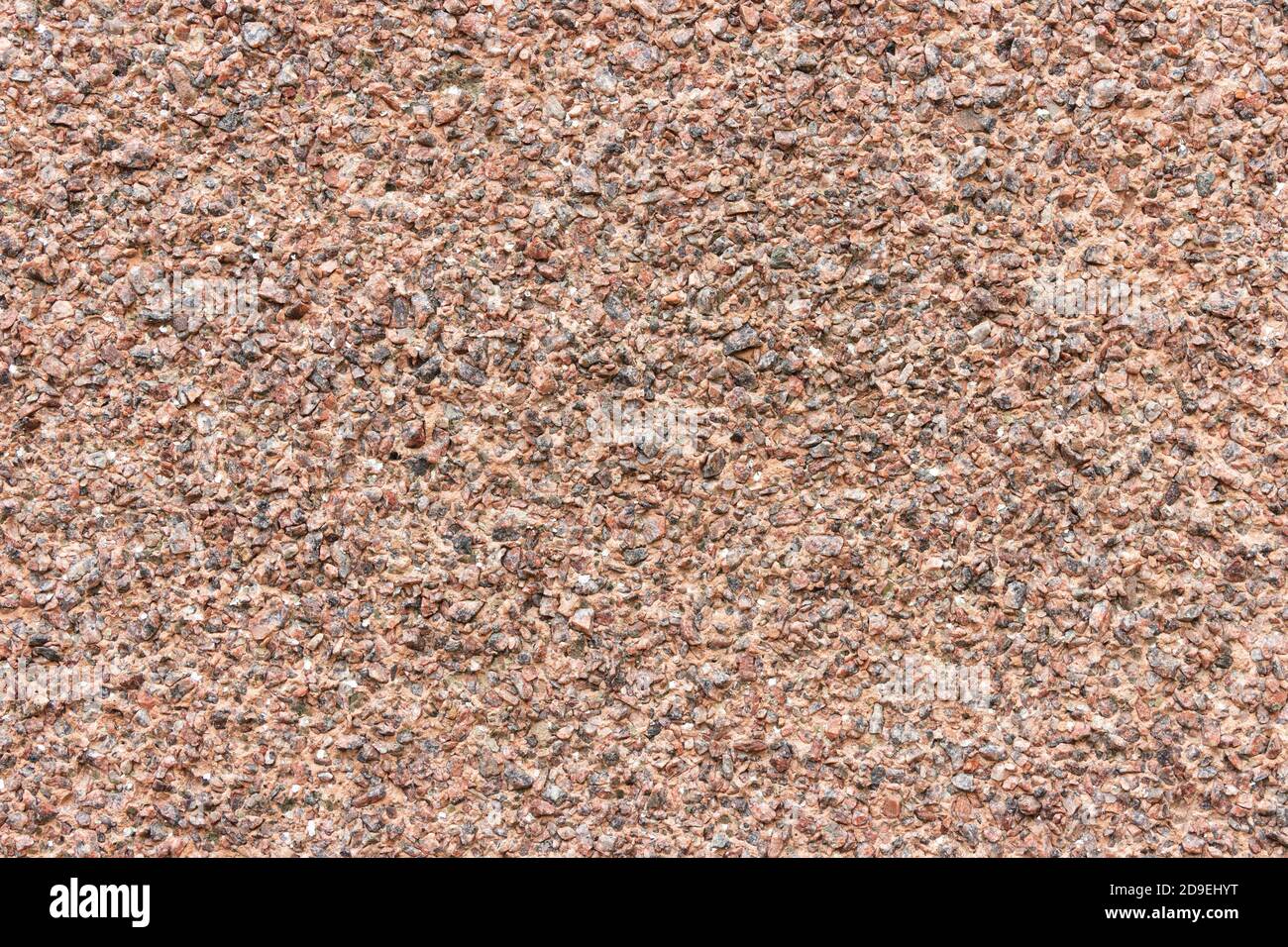 La superficie di una parete ruvida e irregolare, intonacata con fini  trucioli di marmo Foto stock - Alamy