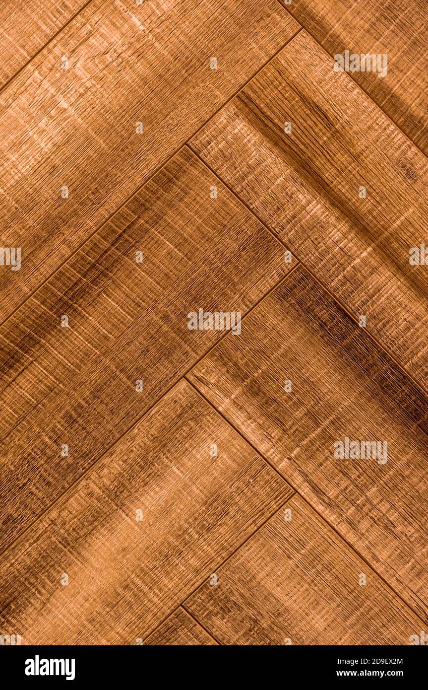 Parquet herringbone chevron legno fondo texture pavimento Foto Stock