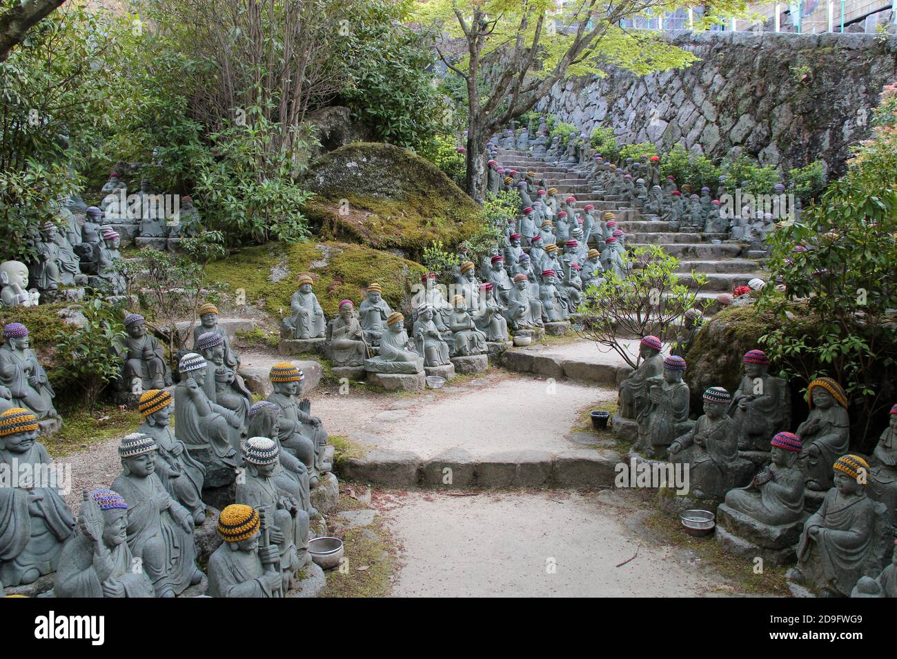 statue di divinità (jizo) al tempio daisho-in a miyajima (giappone) Foto Stock