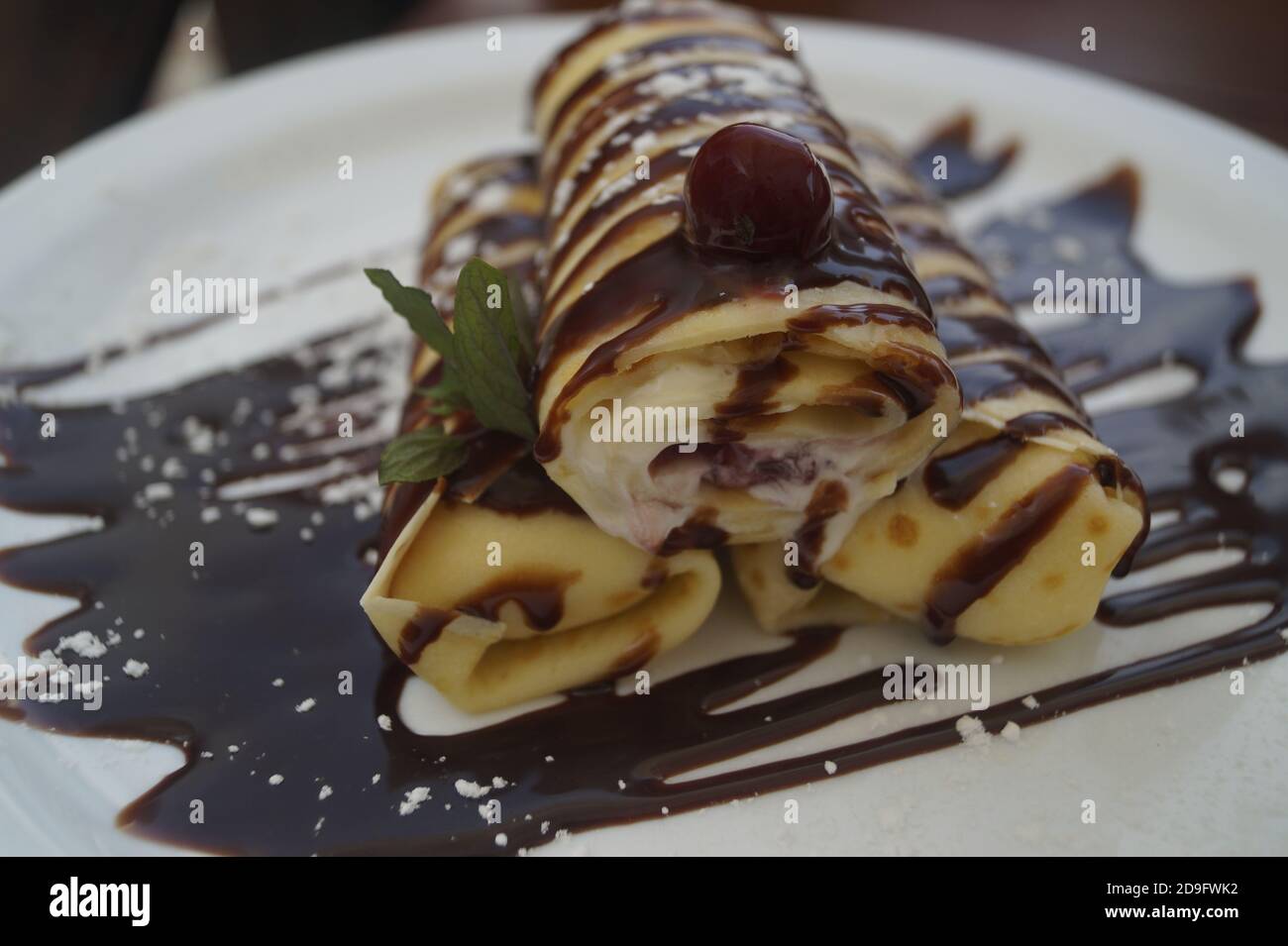 frittelle dolci arrotolate Foto Stock