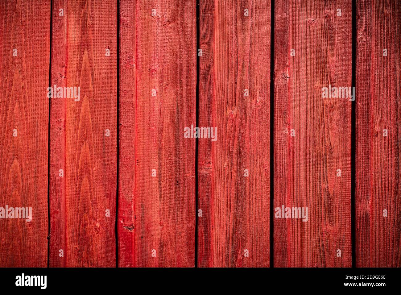 Closeup di grunge in legno rosso. Struttura naturale. Può essere utilizzato come sfondo naturale Foto Stock