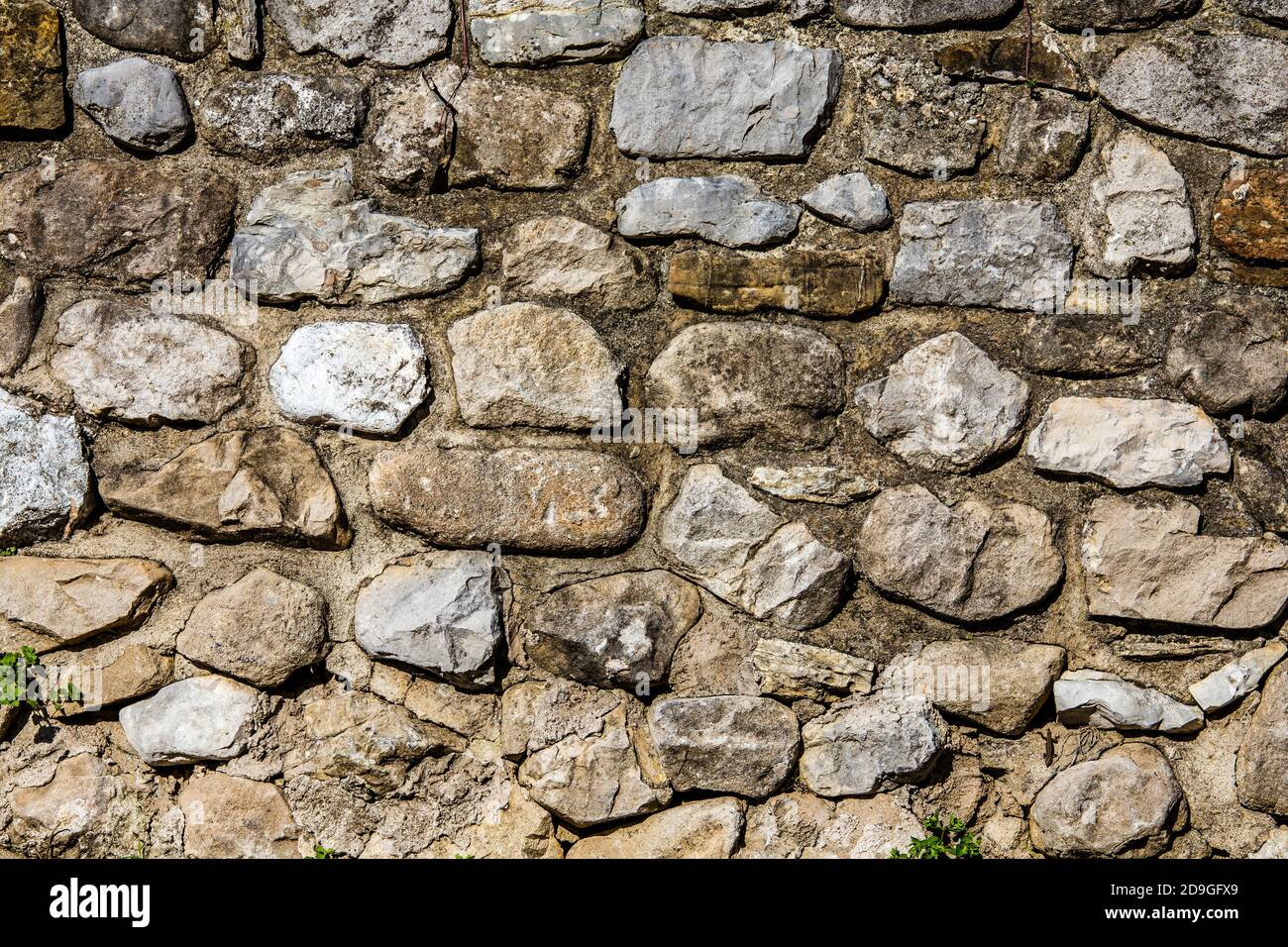 Struttura di un muro di pietra. Muro di pietra come sfondo o struttura. Foto Stock