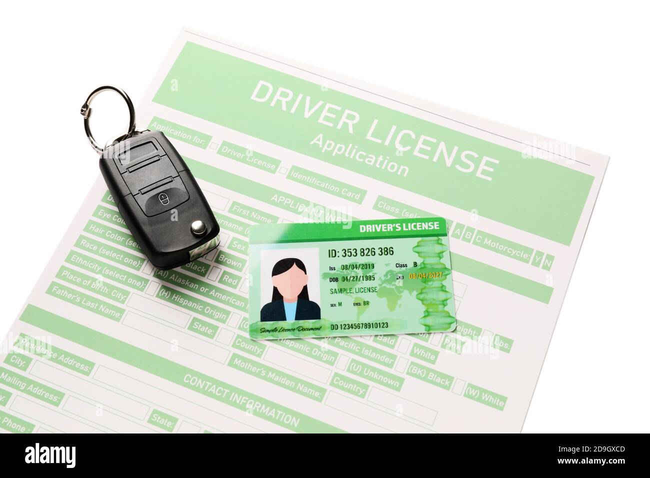 Patente di guida con modulo di richiesta e chiave su sfondo bianco Foto Stock